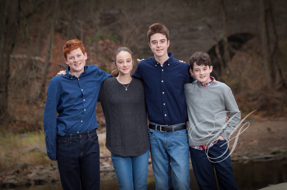 A group of people standing next to each other.