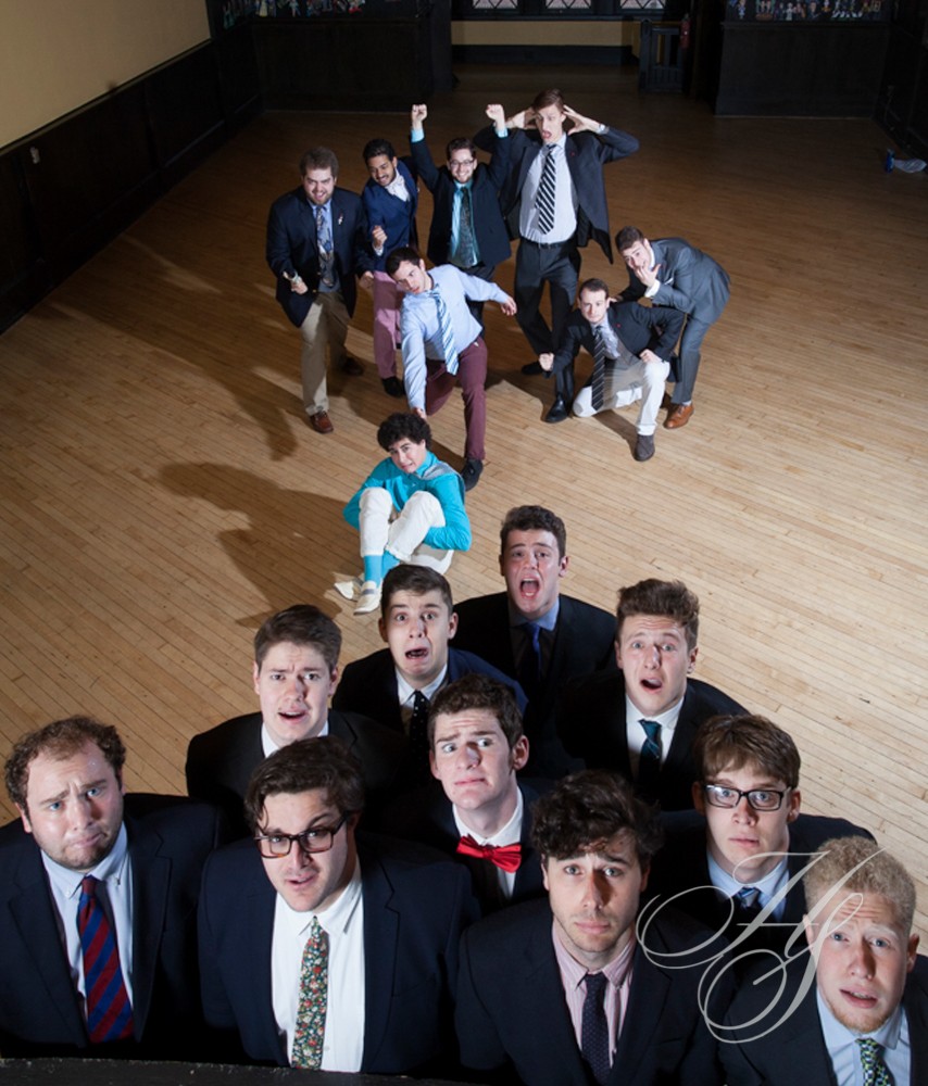 A group of men in suits and ties posing for the camera.