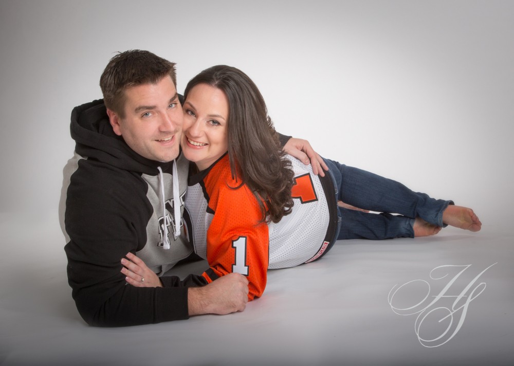 A man and woman posing for a picture.