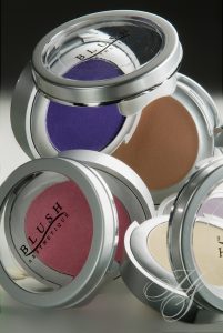 A close up of some different colored eye shadows