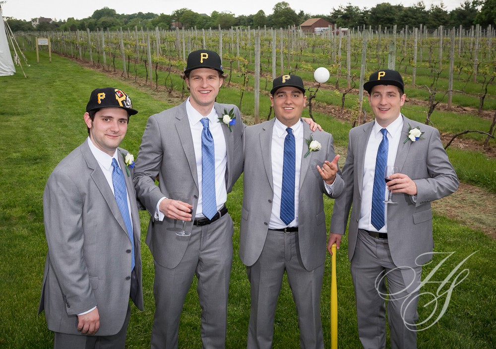 A group of men in suits and hats standing next to each other.
