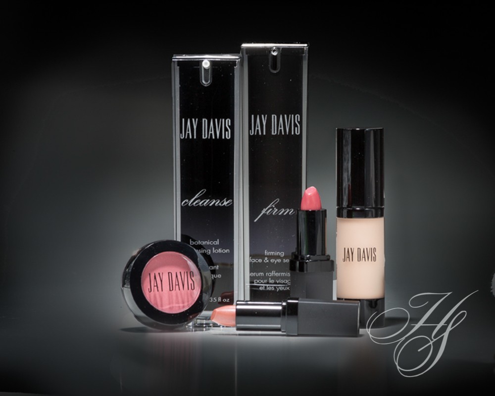 A collection of cosmetics and makeup products.