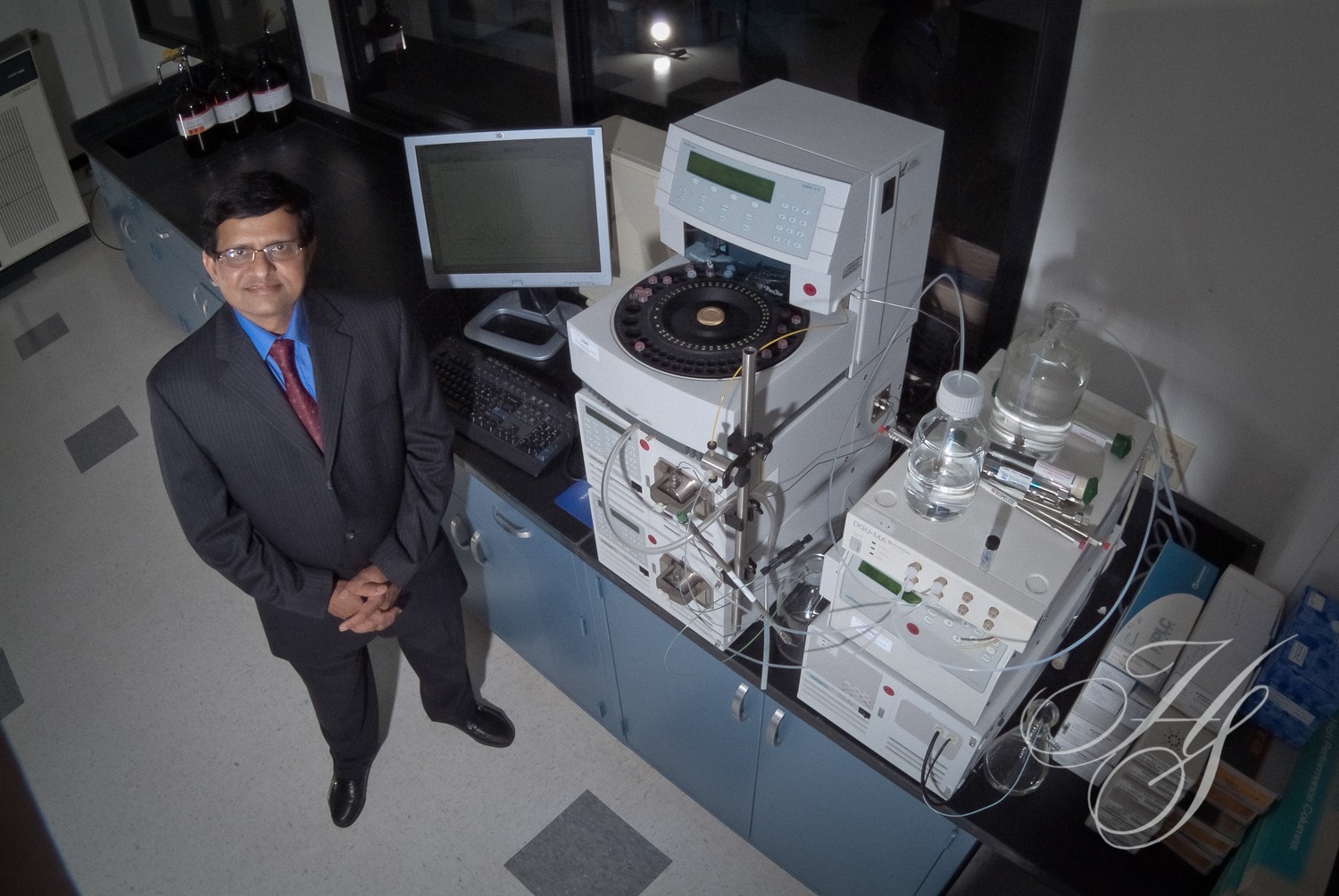 A man standing in front of some machines