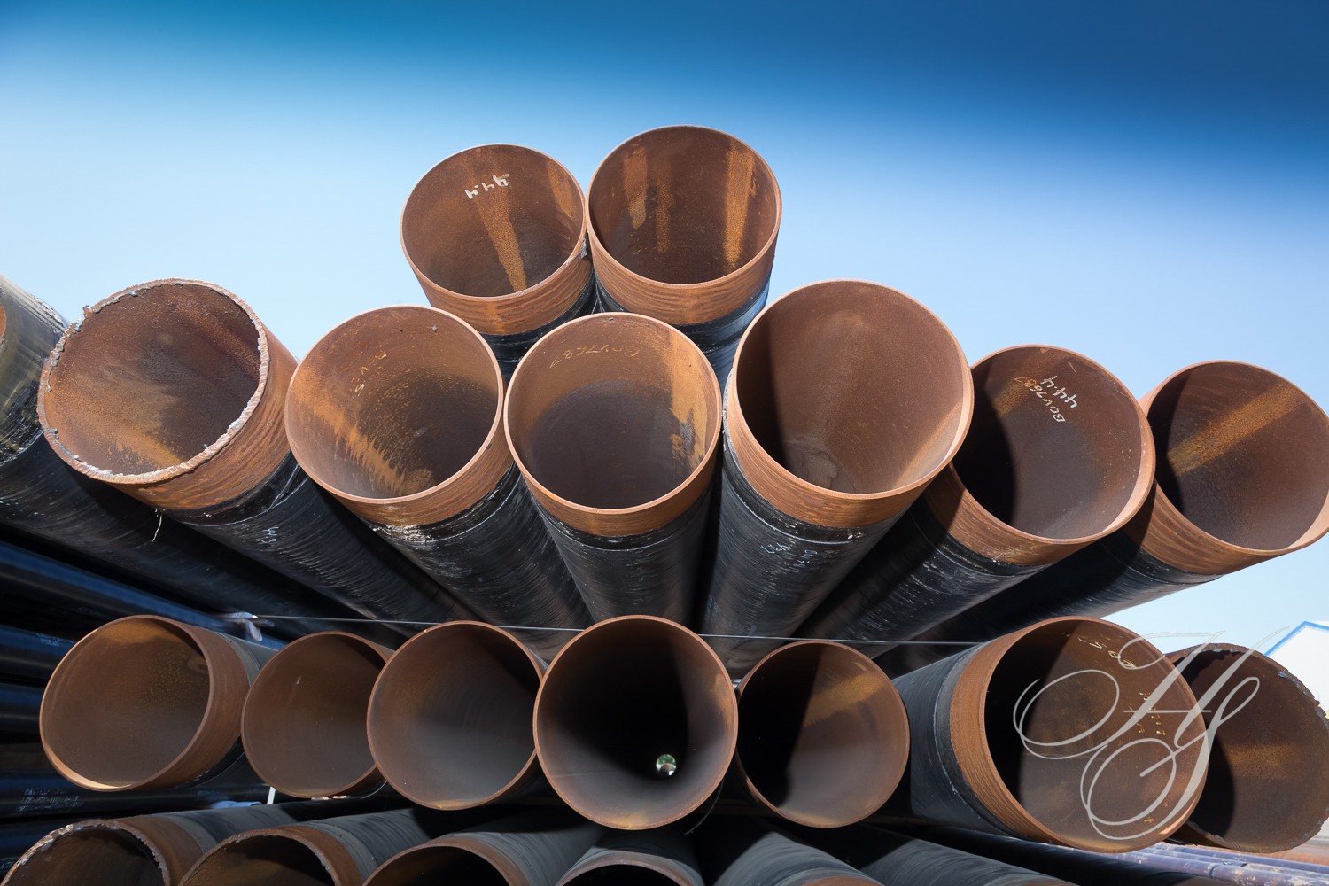 A bunch of pipes that are stacked together