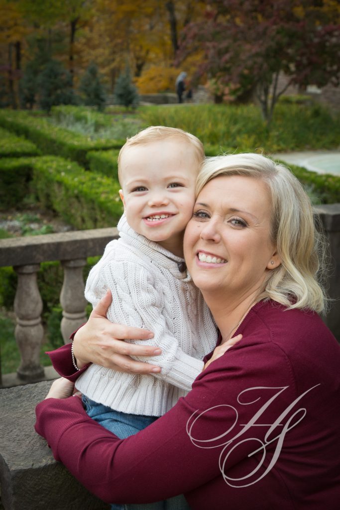 A woman holding a child in her arms.