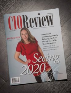 A magazine cover with a woman in red dress.