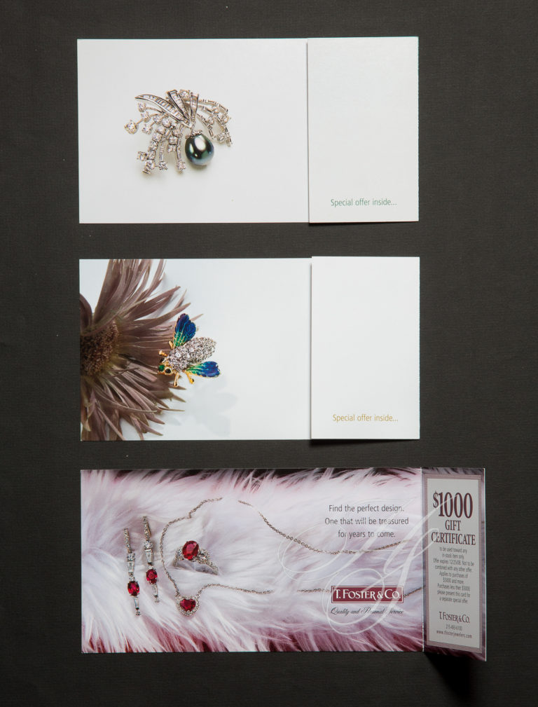 Three different cards with feathers on them