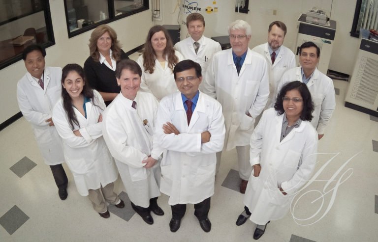 A group of doctors standing in a room.