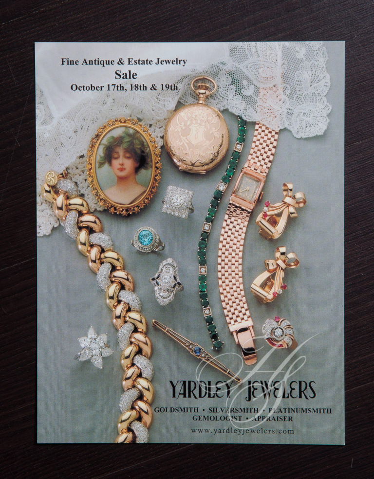 A catalog of jewelry and watches is shown.