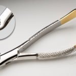 A close up of a pair of scissors with a picture of the side.